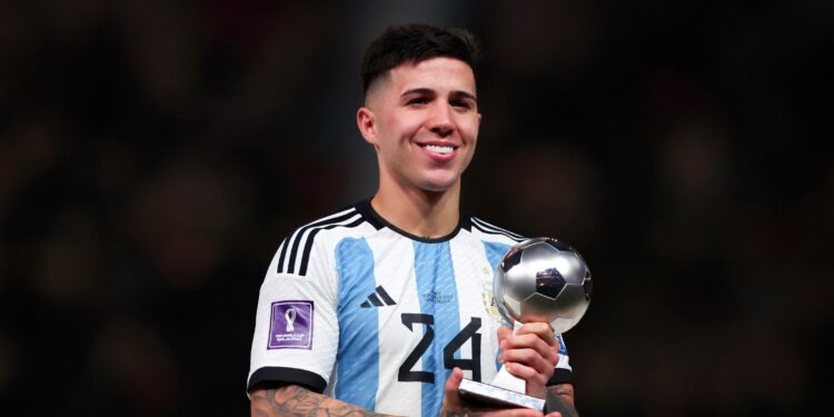 LUSAIL CITY, QATAR - DECEMBER 18: Enzo Fernandez of Argentina poses with his young player of the tournament award during the FIFA World Cup Qatar 2022 Final match between Argentina and France at Lusail Stadium on December 18, 2022 in Lusail City, Qatar. (Photo by Marc Atkins/Getty Images)