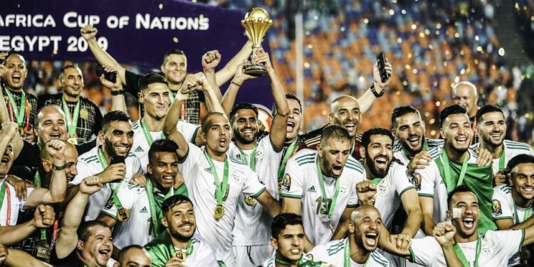 Riyad Mahrez of Algeria celebrate with his team-mates during the 2019 Africa Cup of Nations final soccer match between Senegal and Algeria at the Cairo International Stadium on 19th July 2019 Photo: Ulrik Pedersen / Icon Sport