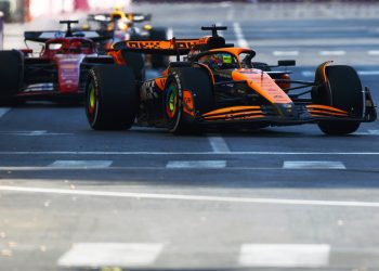 BAKU, AZERBAIJAN - SEPTEMBER 15: Oscar Piastri of Australia driving the (81) McLaren MCL38 Mercedes leads Charles Leclerc of Monaco driving the (16) Ferrari SF-24 during the F1 Grand Prix of Azerbaijan at Baku City Circuit on September 15, 2024 in Baku, Azerbaijan. (Photo by Joe Portlock - Formula 1/Formula 1 via Getty Images)