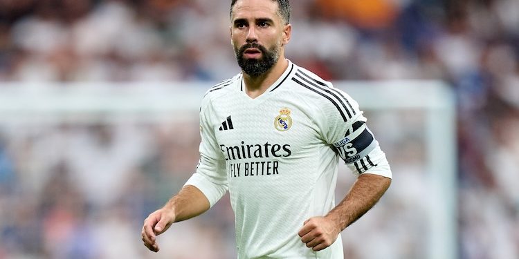 MADRID, SPAIN - AUGUST 25: Daniel Carvajal of Real Madrid looks on during the La Liga match between Real Madrid CF and Real Valladolid CF at Estadio Santiago Bernabeu on August 25, 2024 in Madrid, Spain. (Photo by Angel Martinez/Getty Images)