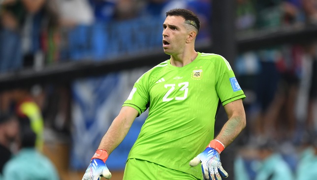 LUSAIL CITY, QATAR - DECEMBER 18: Emiliano Martinez of Argentina celebrates after saving the second penalty by Kingsley Coman of France during the FIFA World Cup Qatar 2022 Final match between Argentina and France at Lusail Stadium on December 18, 2022 in Lusail City, Qatar. (Photo by Shaun Botterill - FIFA/FIFA via Getty Images)