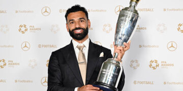 MANCHESTER, ENGLAND - AUGUST 19: Mohamed Salah poses with the Men’s PFA Players' Player of the Year award during the PFA Awards 2025 at the Manchester Opera House on August 19, 2025 in Manchester, England. (Photo by Shirlaine Forrest/Getty Images)
