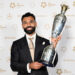 MANCHESTER, ENGLAND - AUGUST 19: Mohamed Salah poses with the Men’s PFA Players' Player of the Year award during the PFA Awards 2025 at the Manchester Opera House on August 19, 2025 in Manchester, England. (Photo by Shirlaine Forrest/Getty Images)