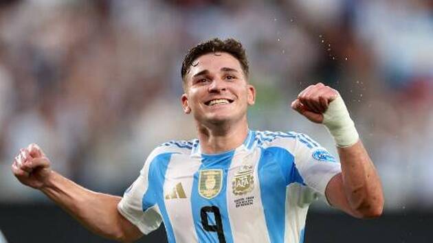 Argentina's forward #09 Julian Alvarez celebrates scoring his team's first goal during the Conmebol 2024 Copa America tournament semi-final football match between Argentina and Canada at MetLife Stadium, in East Rutherford, New Jersey on July 9, 2024. (Photo by CHARLY TRIBALLEAU / AFP)