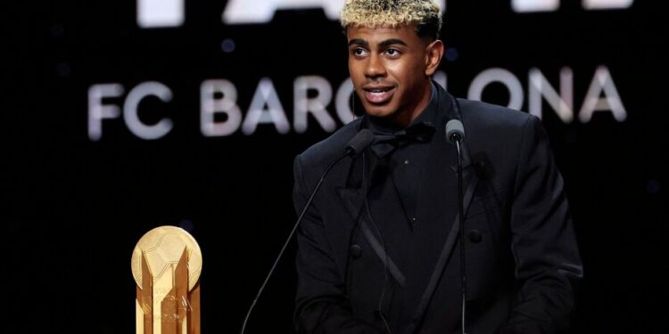 Barcelona's Spanish forward Lamine Yamal speaks after receiving the Kopa Trophy for the best under-21 player during the 2025 Ballon d'Or France Football award ceremony at the Theatre du Chatelet in Paris on September 22, 2025. (Photo by Franck FIFE / AFP)